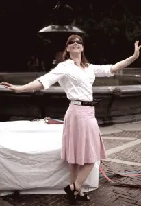 Max in a pink skirt and safety belt
